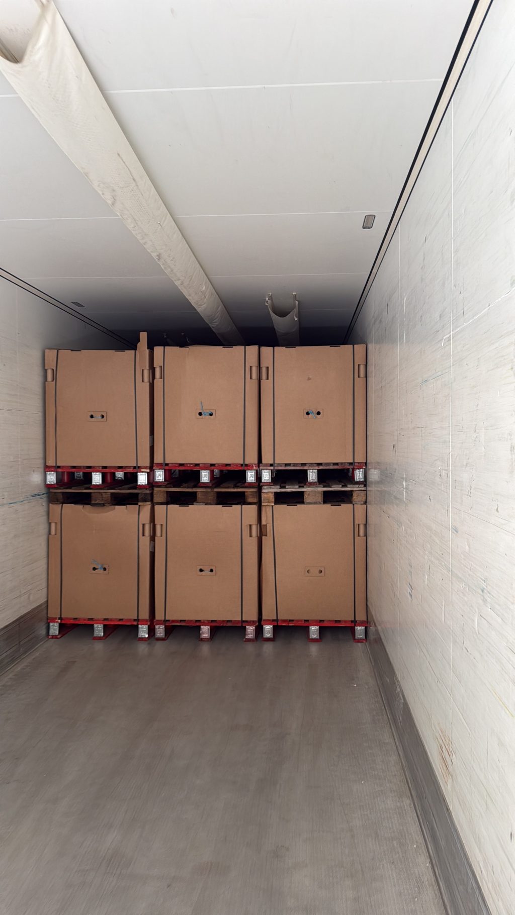 Cardboard bulk bins of watermelons loaded in a trailer